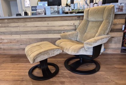 Malibu Swivel Recliner with Footstool in Comber Caramel Malibu Swivel Recliner with Footstool in Comber Caramel